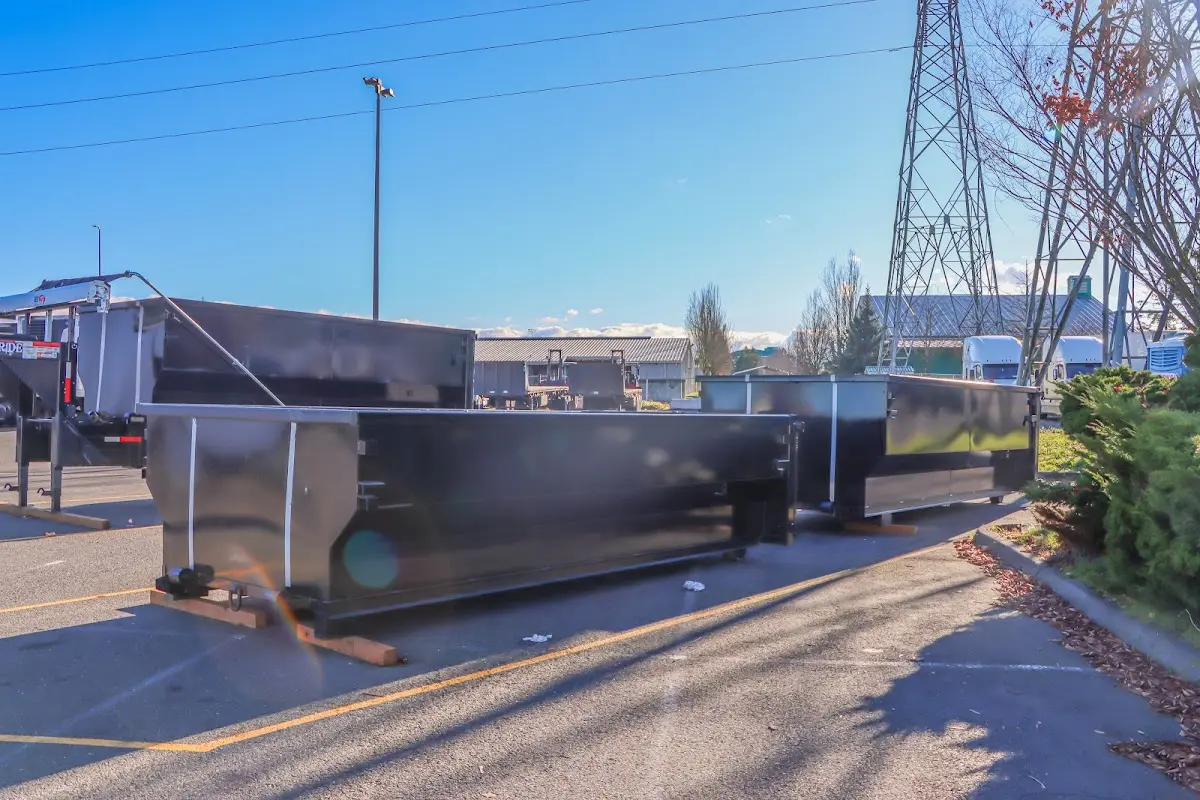 Roll-off dumpster ready for waste disposal at job site for Roofing Dumpster Rental in Hope Mills